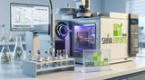 A high-resolution laboratory setup showing a gas chromatography-mass spectrometry (GC-MS) system, with clean glass vials containing clear liquid, soft scientific blue lighting, depth of field.