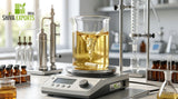A close-up of a laboratory magnetic stirrer mixing a golden-tinted fragrance concentrate in a borosilicate glass beaker, creating a gentle vortex, with stainless steel equipment in the background